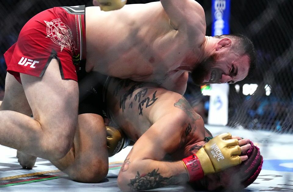 梅拉布·德瓦利甚維利 (Merab Dvalishvili) 在 UFC 306 主賽事中憑藉令人瘋狂的表現擊敗肖恩·奧馬利 (Sean O’Malley) 眉毛冠軍